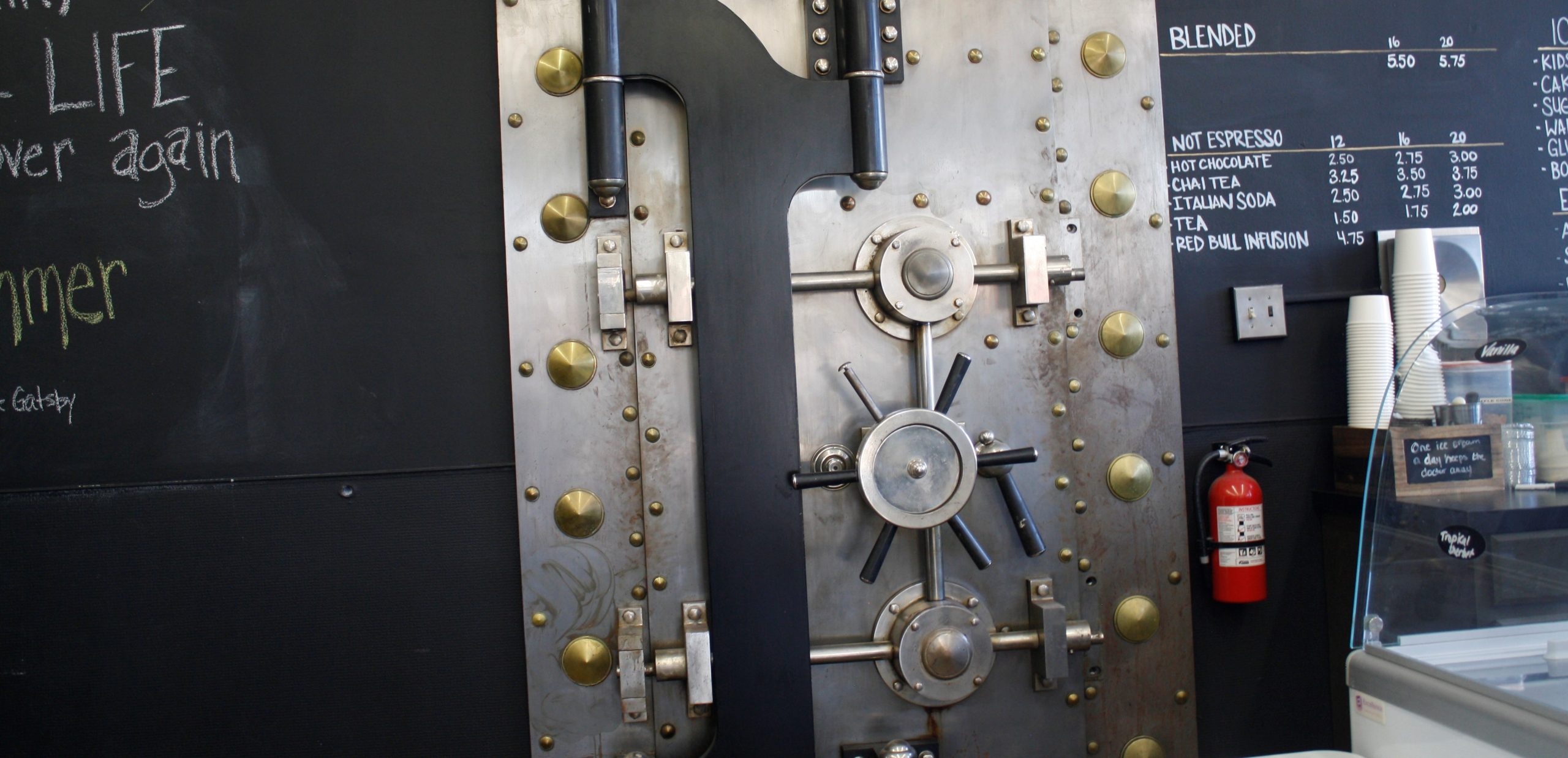 A photo of the Vault door at Vault Books and Brew.